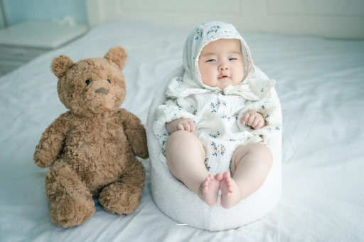 广州借卵试管代怀包男孩宝宝7个月发育标准